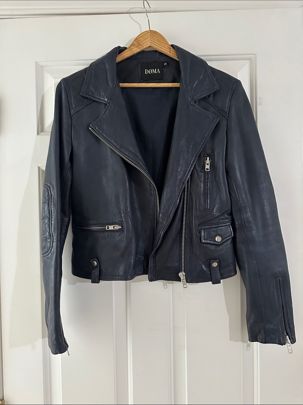 Doma Navy Leather Moto Jacket with Silver Hardware.